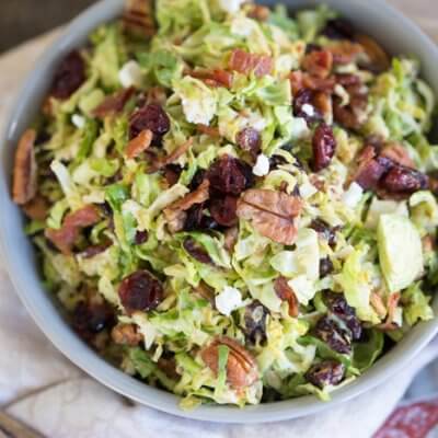 Shaved Brussels Sprouts Salad with Citrus Bacon Vinaigrette... the best hearty and nourishing winter side salad to add to your holiday menu.