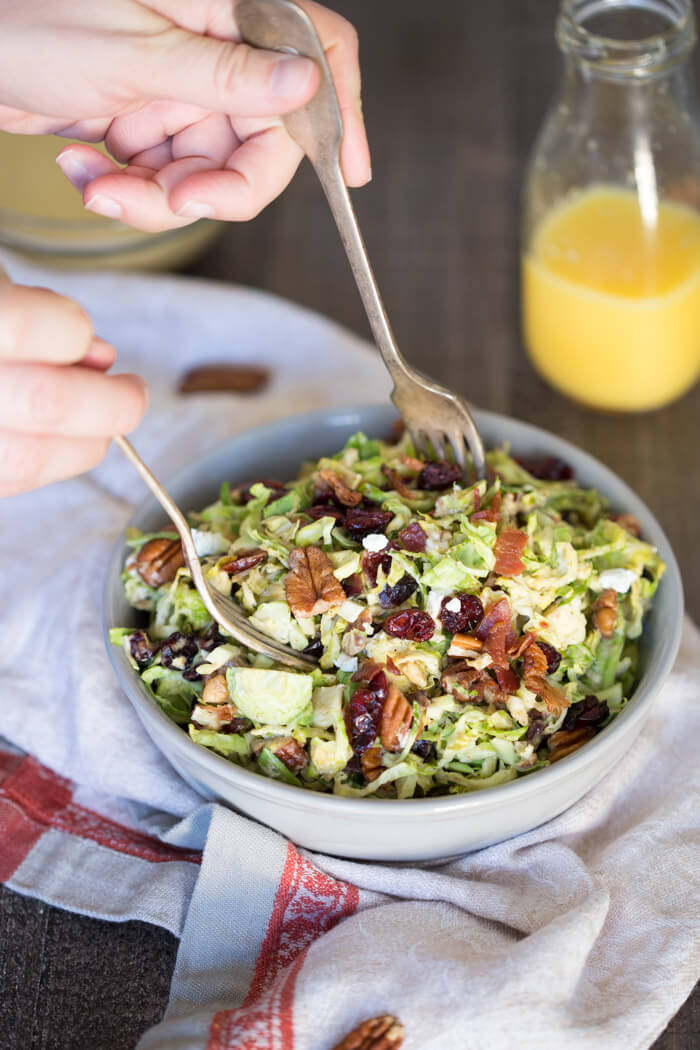 Shaved Brussels Sprout Salad with Citrus Bacon Vinaigrette... the best hearty and nourishing winter side salad to add to your holiday menu. 