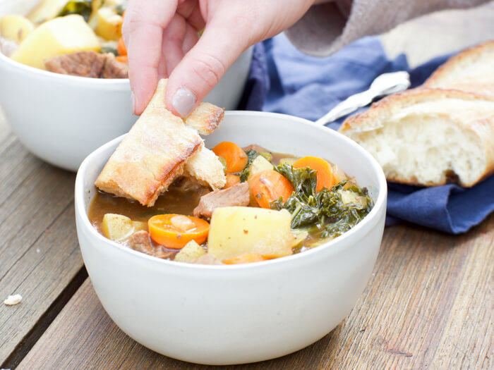 Drunken Potato Kale Beef Stew, a hearty guy friendly comfort food meal-- simple ingredients, minimal prep and a bottle of beer, what more could you want at dinner time?