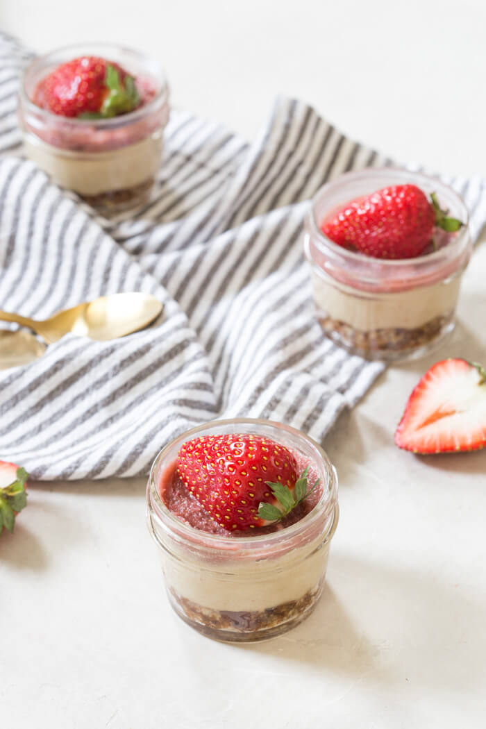 These Vegan Strawberry Cheesecake Minis are life right now. I love how simple ingredients can be made into a sweet treat in no time... right in the blender!