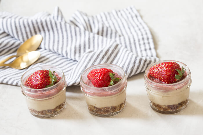 These Vegan Strawberry Cheesecake Minis are life right now. I love how simple ingredients can be made into a sweet treat in no time... right in the blender!