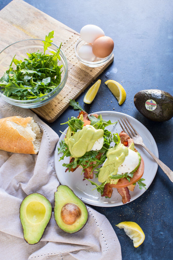 Eggs Benedict BLT with Avocado Hollandaise, a hearty comforting breakfast recipe that's packed with nutrition thanks to avocados.