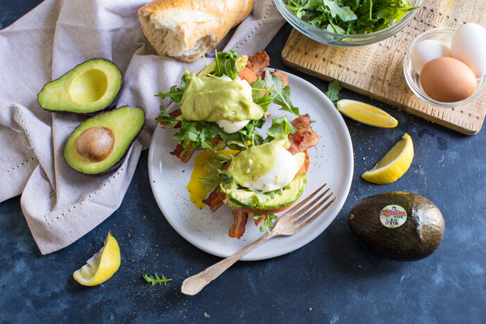 Eggs Benedict BLT with Avocado Hollandaise, a hearty comforting breakfast recipe that's packed with nutrition thanks to avocados.