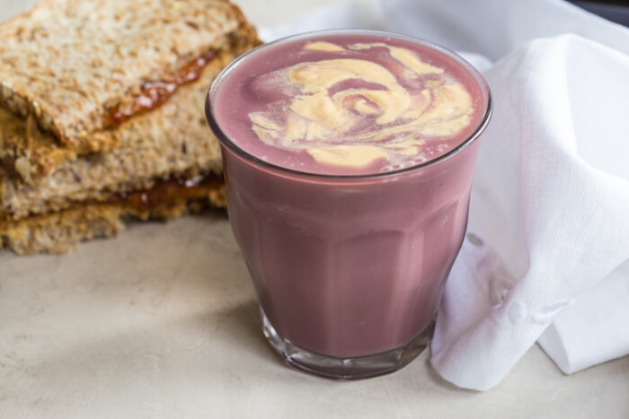 PB&J Chickpea Smoothie, a vegan protein shake that takes you back to your childhood. We love this recipe because it’s made with 4 whole food ingredients—chickpeas, 100% grape juice, peanut butter, and flax. Gimme. 