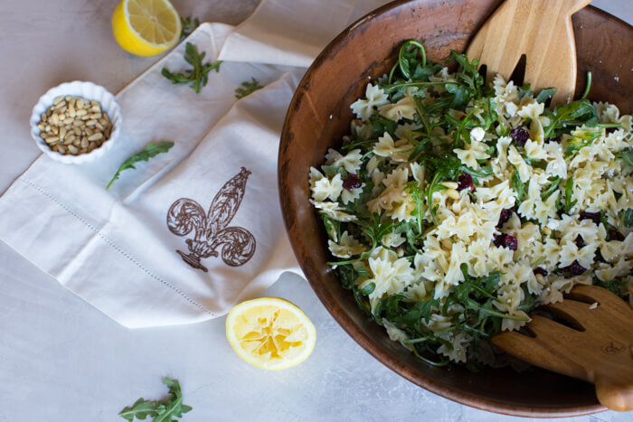 Lemon Arugula Pasta Salad. This is what it looks like to live your best springy pasta life. Easy to make ahead for baby or wedding shower!