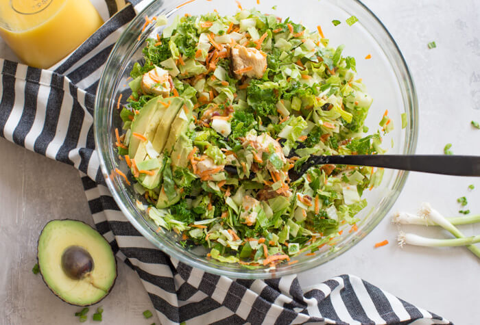 OH ME OH MY! This Farmhouse Chicken Chopped Salad with romaine, cabbage, kale, carrots, grilled chicken breast, bacon, sunflower seeds and avocado tossed in a tangy orange honey mustard dressing is my jam.