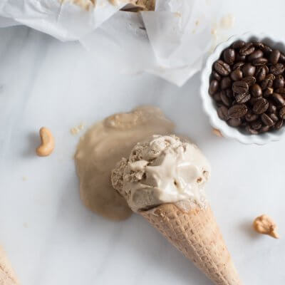 Coffee Cashew Ice Cream. You guys, ice cream this time of year is pretty much life. It's so hot and this dairy free and vegan ice cream makes the perfect sweet treat to enjoy any time of day. I mean it's made with only ingredients-- cashews, iced coffee, almond milk and maple syrup.