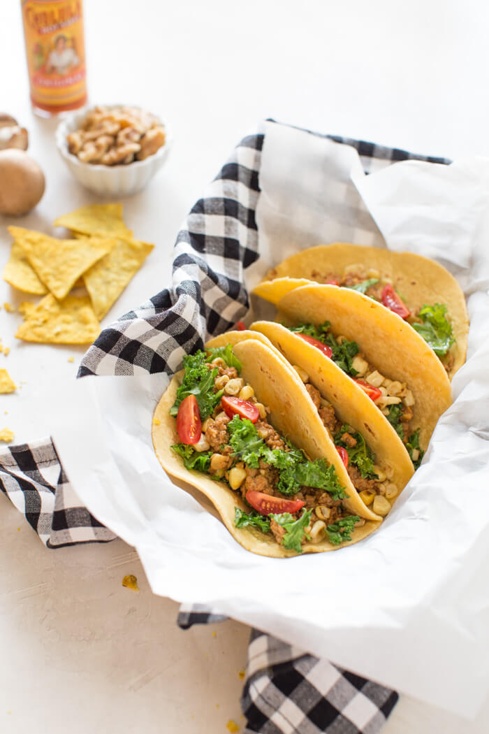 Superfood Turkey Tacos a family favorite with an extra dose of veggies that you can't see. :) Ground turkey tacos sautéed with super tiny mushrooms, walnuts, and cauliflower rice to make a mostly plant based meaty meal.