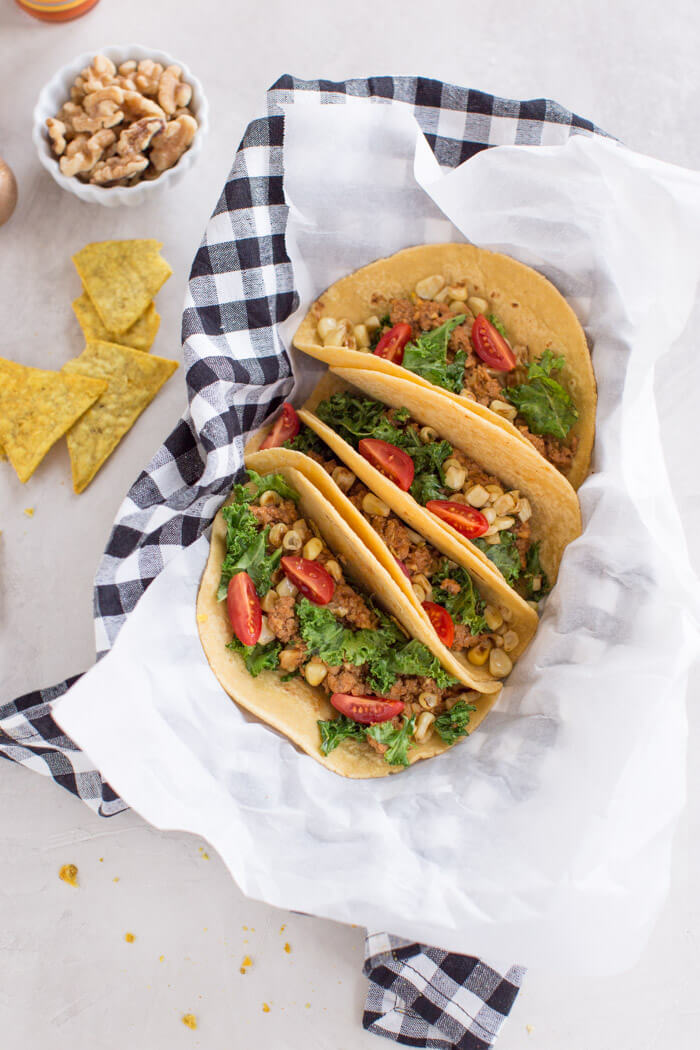 Superfood Turkey Tacos a family favorite with an extra dose of veggies that you can't see. :) Ground turkey tacos sautéed with super tiny mushrooms, walnuts, and cauliflower rice to make a mostly plant based meaty meal.