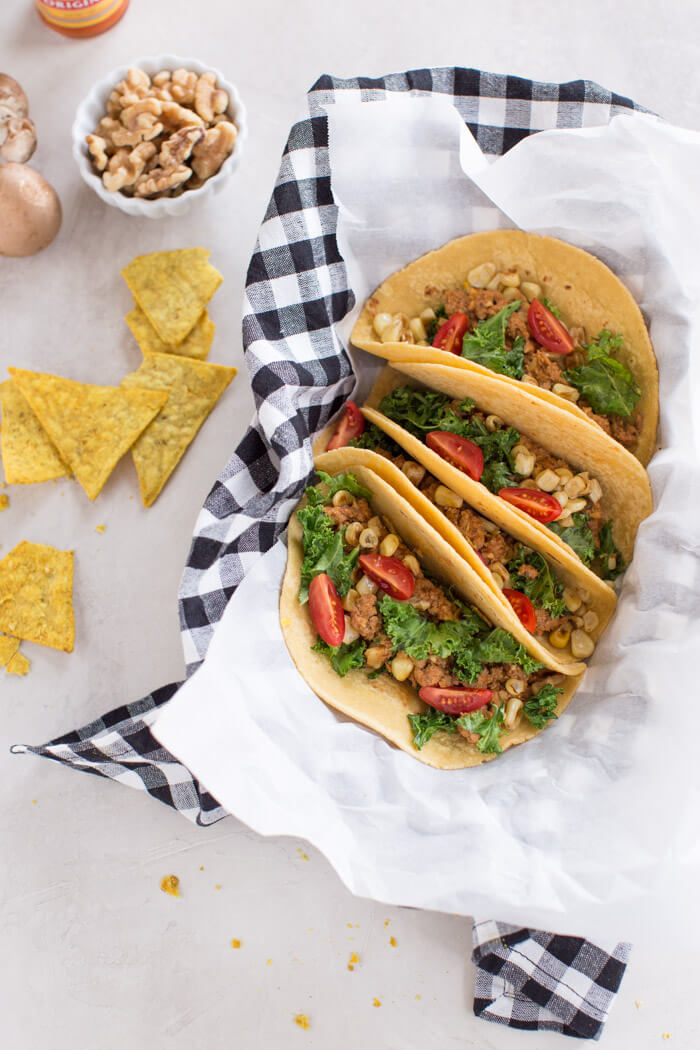 Superfood Turkey Tacos a family favorite with an extra dose of veggies that you can't see. :) Ground turkey tacos sautéed with super tiny mushrooms, walnuts, and cauliflower rice to make a mostly plant based meaty meal.