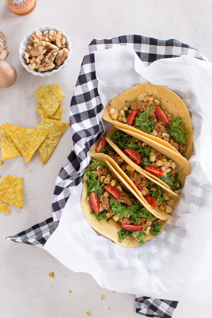 Superfood Turkey Tacos a family favorite with an extra dose of veggies that you can't see. :) Ground turkey tacos sautéed with super tiny mushrooms, walnuts, and cauliflower rice to make a mostly plant based meaty meal.