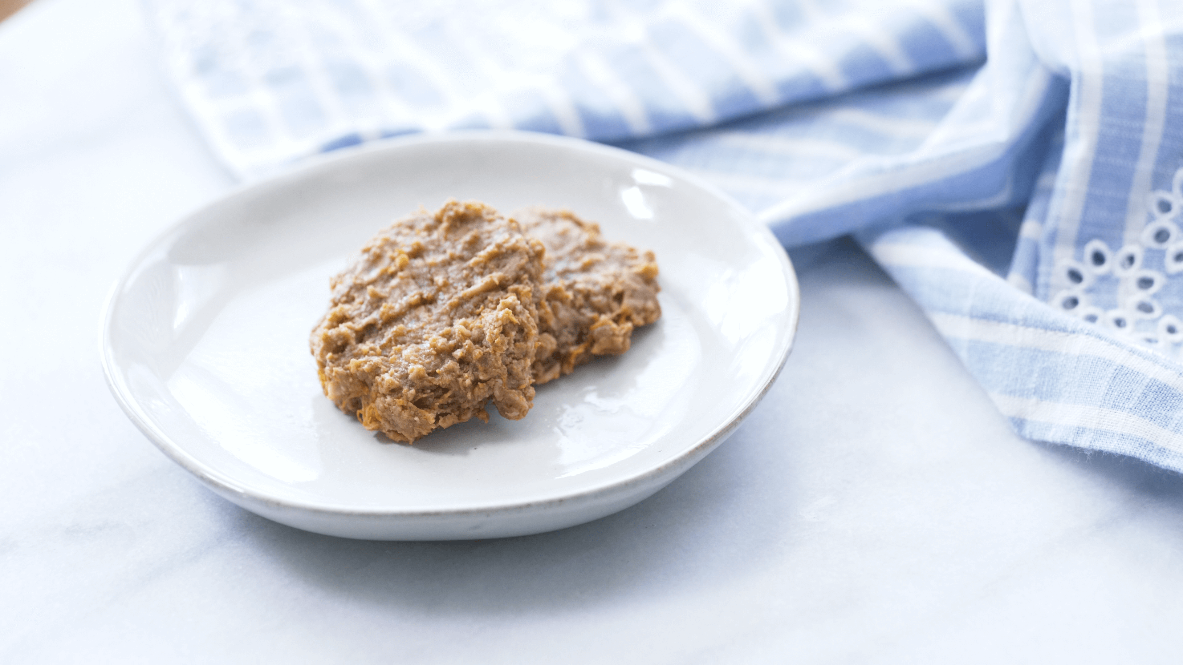 Soft PB Oatmeal Cookies made with butternut squash! With the latest research suggesting early peanut introduction, we've rounded up 8 ways on how to feed peanut butter to baby.