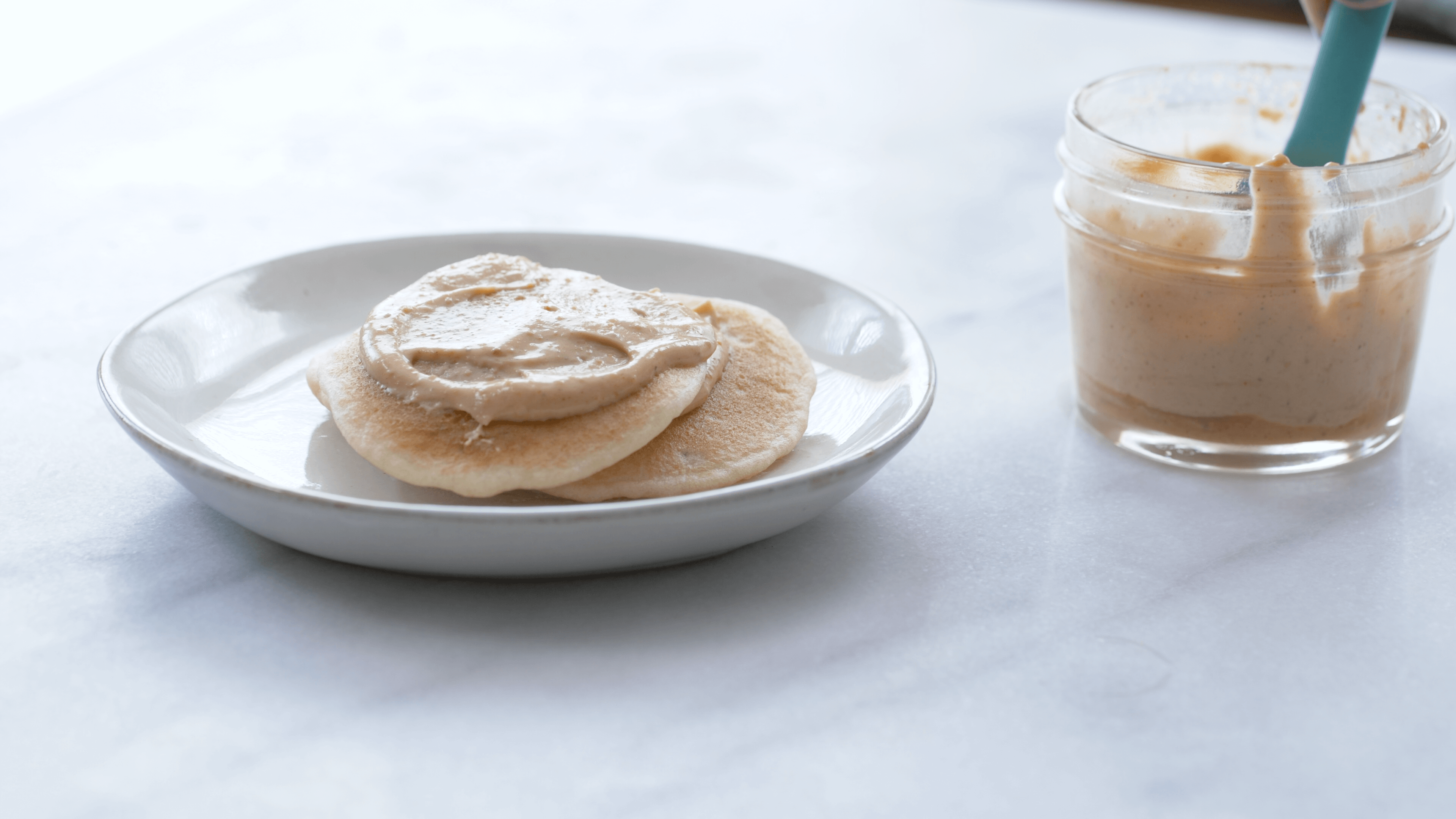 Fluffy PB spread on pancakes-- whip PB with hot water. With the latest research suggesting early peanut introduction, we've rounded up 8 ways on how to feed peanut butter to baby.