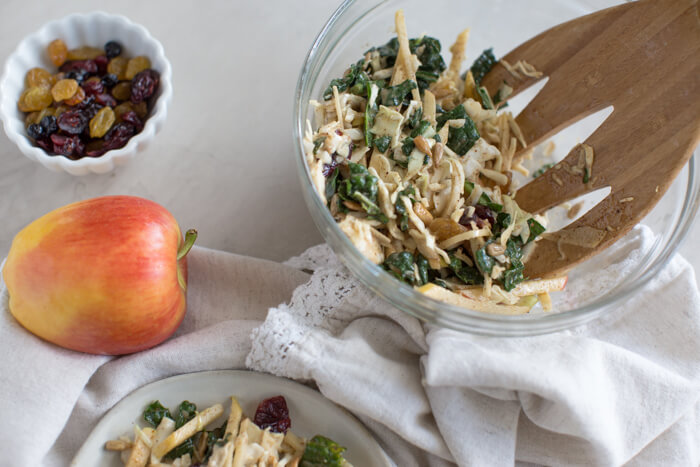 Apple Crunch Slaw with Almond Butter Dressing... yep, let's talk legit fall food over here. We love the crunch in this plant-based salad from all the shredded veggies, apples, and sunflower seeds.