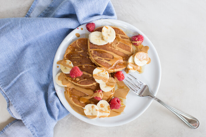 These fluffy peanut butter protein pancakes are protein packed with cottage cheese and peanut powder and made straight in the blender for easy mixing. Meal prep these peanut butter protein pancakes to freeze and reheat for quick breakfast, brinner, or pre/post workout fuel. 