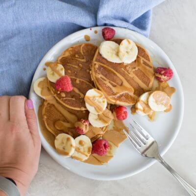 These fluffy peanut butter protein pancakes are protein packed with cottage cheese and peanut powder and made straight in the blender for easy mixing. Meal prep these peanut butter protein pancakes to freeze and reheat for quick breakfast, brinner, or pre/post workout fuel. 
