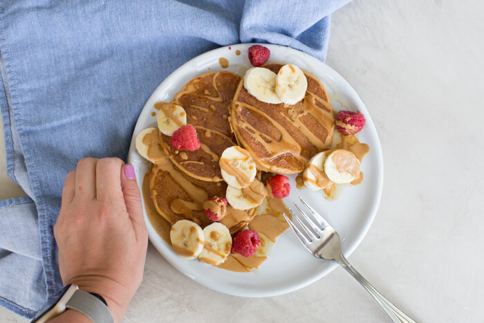 These fluffy peanut butter protein pancakes are protein packed with cottage cheese and peanut powder and made straight in the blender for easy mixing. Meal prep these peanut butter protein pancakes to freeze and reheat for quick breakfast, brinner, or pre/post workout fuel. 