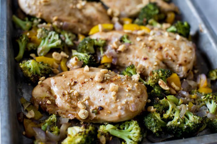 Winner winner Sheet Pan Peanut Butter Chicken and Broccoli dinner. We love sheet pan dinners and this one tastes like healthy Chinese take out!