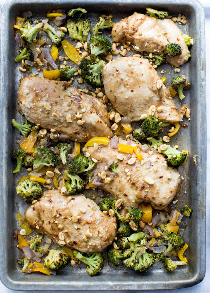 Winner winner Sheet Pan Peanut Butter Chicken and Broccoli dinner. We love sheet pan dinners and this one tastes like healthy Chinese take out!