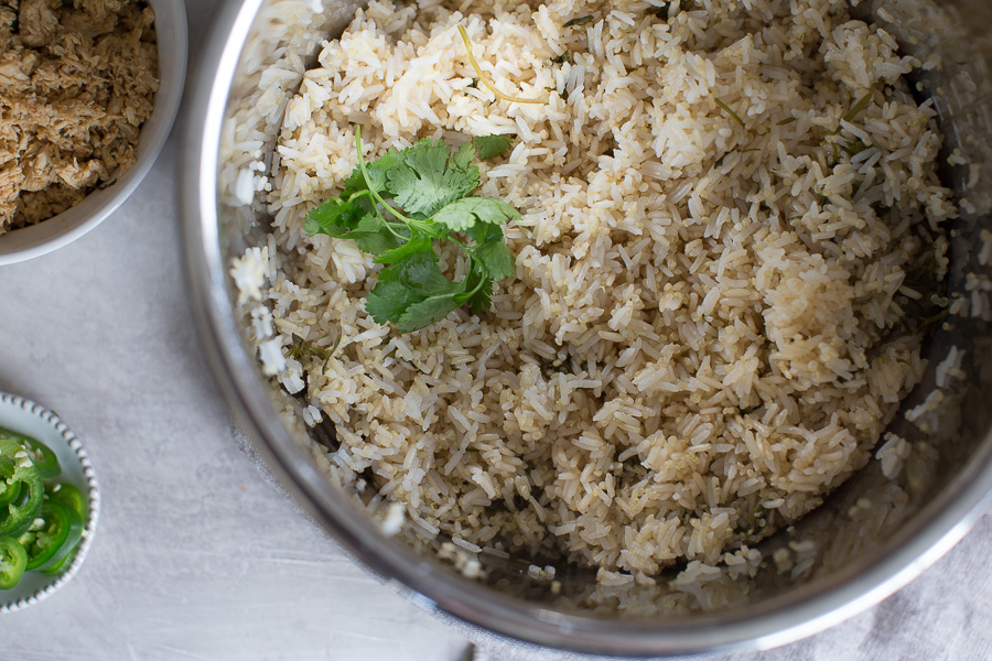 Close up shot of cilantro lime rice in the Instant Pot topped with fresh cilantro