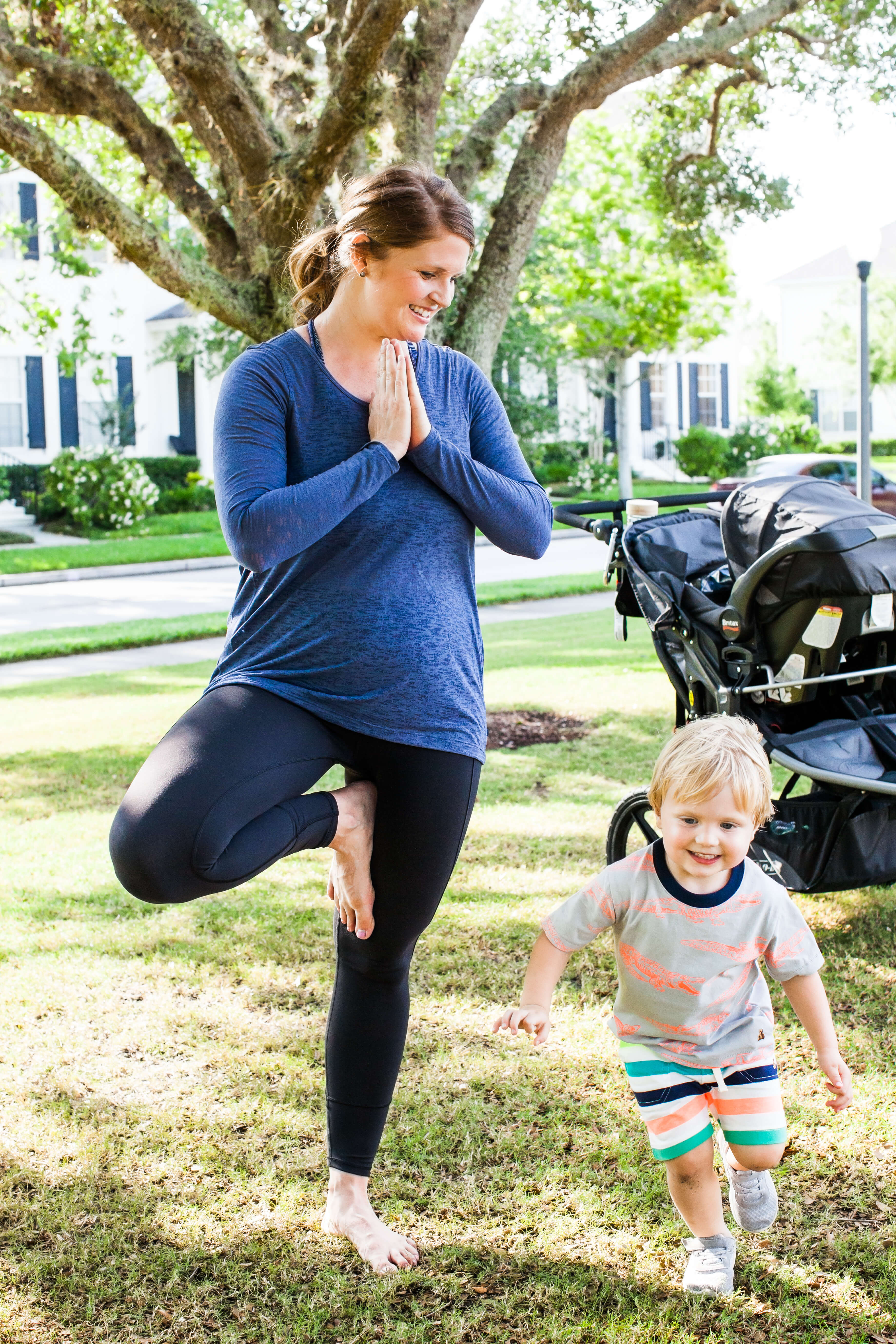 mommy doing yoga and toddler running