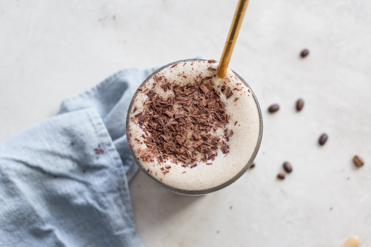 creamy low sugar protein shake made with coffee and chocolate shavings 