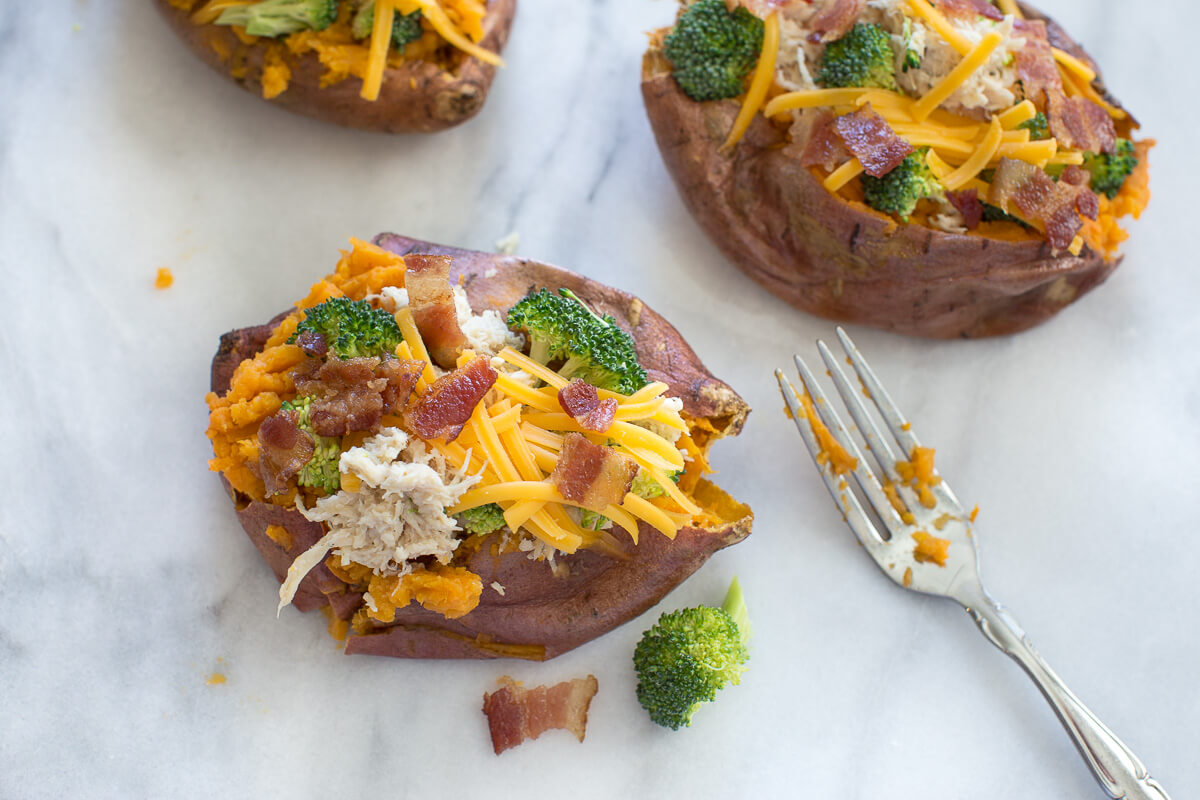 over head shot of crack chicken and broccoli stuffed sweet potato 