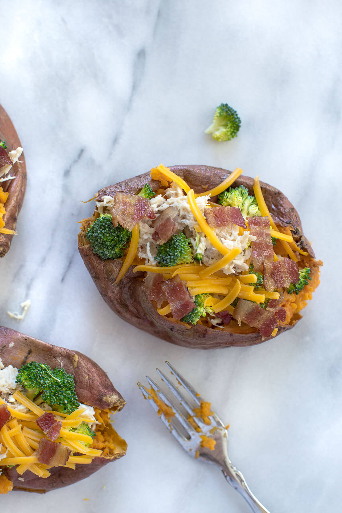 close up shot of crack chicken and broccoli stuffed sweet potato 