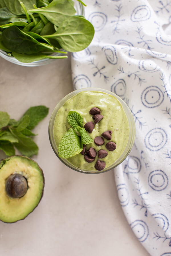 overhead shot of mint chocolate chip avocado smoothie 