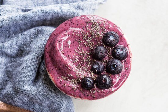 a strawberry blueberry smoothie with peaches and kefir 