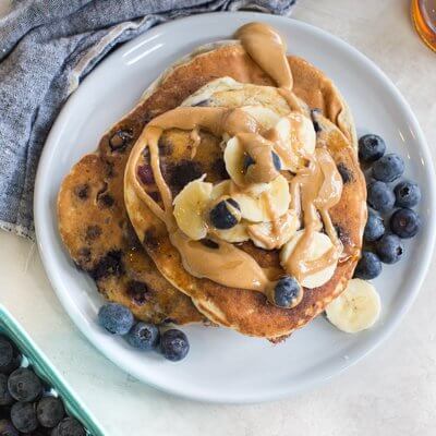 Greek yogurt pancakes recipe made with almond flour, banana and blueberries.