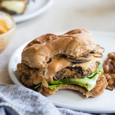 Mushroom Swiss Burger = the best gourmet burger recipe you’ve ever tasted. Complete with the best burger seasoning recipe and simple burger sauce for a juicy homemade mushroom beef burger! 