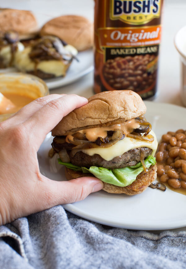 Mushroom Swiss Burger = the best gourmet burger recipe you’ve ever tasted. Complete with the best burger seasoning recipe and simple burger sauce for a juicy homemade mushroom beef burger! 