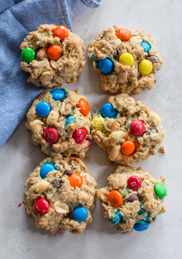 Gluten Free Monster Cookies-- a healthy peanut butter oatmeal cookie recipe with m and ms... your favorite monster trail mix in flourless cookie form.