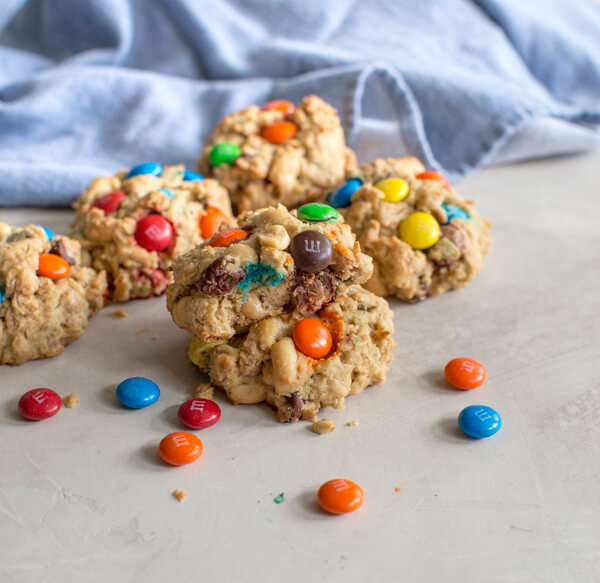 Gluten Free Monster Cookies-- a healthy peanut butter oatmeal cookie recipe with m and ms... your favorite monster trail mix in flourless cookie form.