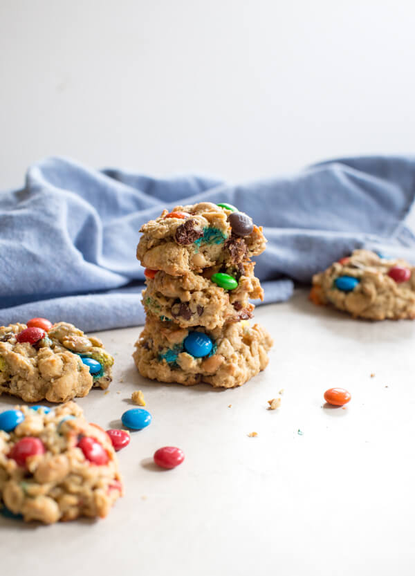 Gluten Free Monster Cookies-- a healthy peanut butter oatmeal cookie recipe with m and ms... your favorite monster trail mix in flourless cookie form.
