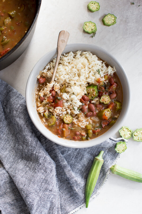 Easy Vegetable Gumbo recipe made with an authentic dark French roux, okra, tomatoes and Creole seasonings. Loaded with Louisiana flavors and beans! 