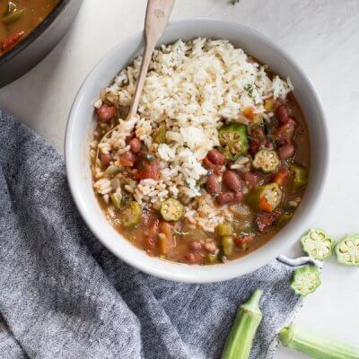 Easy Vegetable Gumbo recipe made with an authentic dark French roux, okra, tomatoes and Creole seasonings. Loaded with Louisiana flavors and beans!