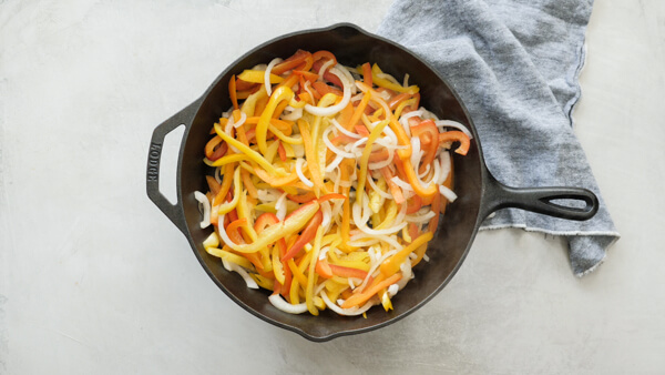 fajita veggies in cast iron skillet