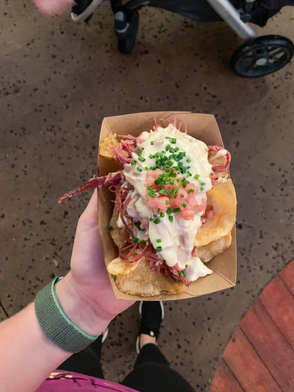 Epcot Food and Wine Festival Smoked Corned Beef with Crispy Potatoes, Cheese Curds, Pickled Onions, and Beer-Cheese Fondue