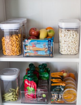 healthy snacks for kids organized in pantry